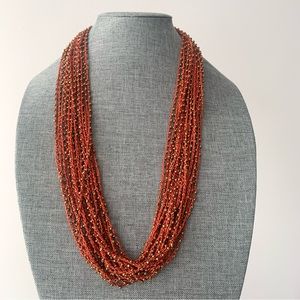 Vintage necklace made of silk cord & brass beads. Lovely Orange/red colo…